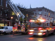 Picture of fire trucks responding to emergency.